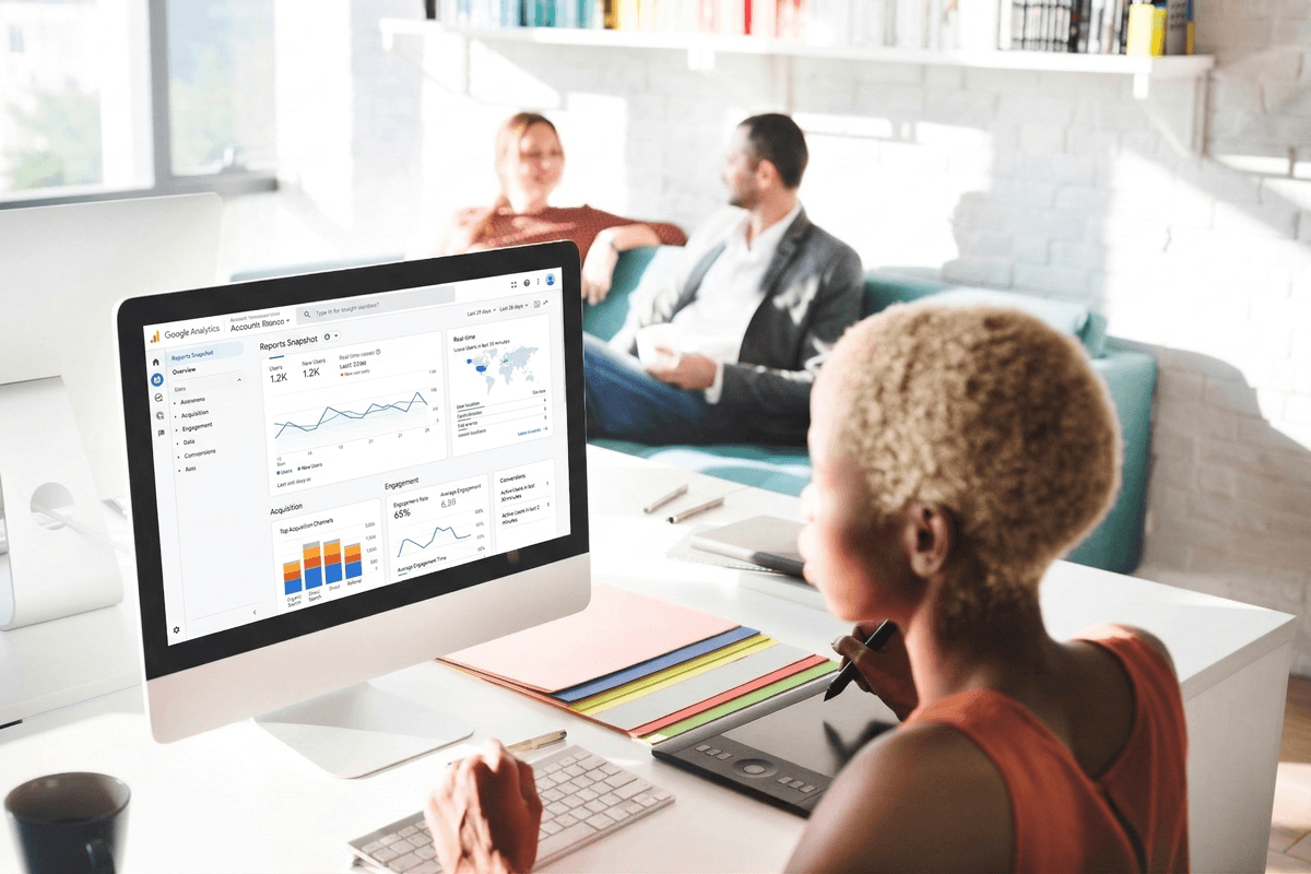 Marketing professional analyzing Google Analytics performance data
